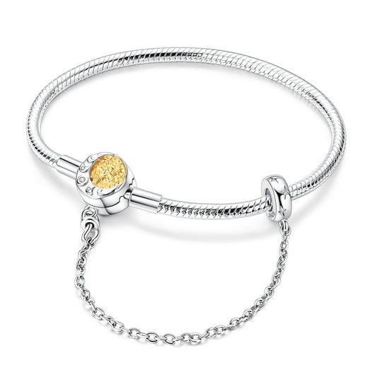 Two-Tone Star and Moon Snake Bone Bracelet